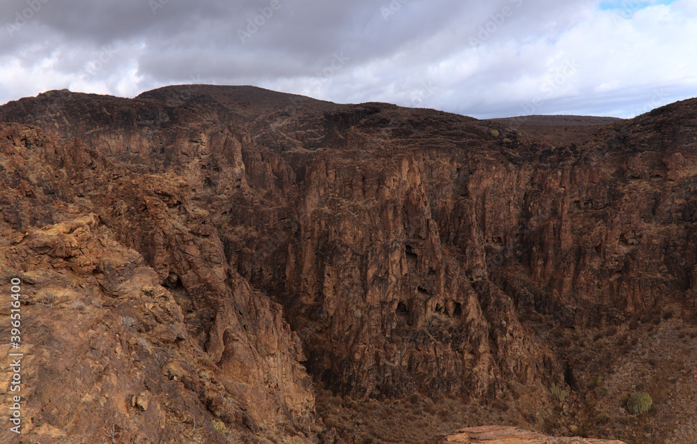 Gran Canaria, landscapes along the hiking route around the ravive Barranco Hondo, The Deep Ravine at the southern part of the 
island, full of caves and grottoes, close to small village Juan Grande