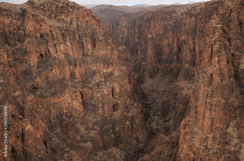 Gran Canaria, landscapes along the hiking route around the ravive Barranco Hondo, The Deep Ravine at the southern part of the 
island, full of caves and grottoes, close to small village Juan Grande photo