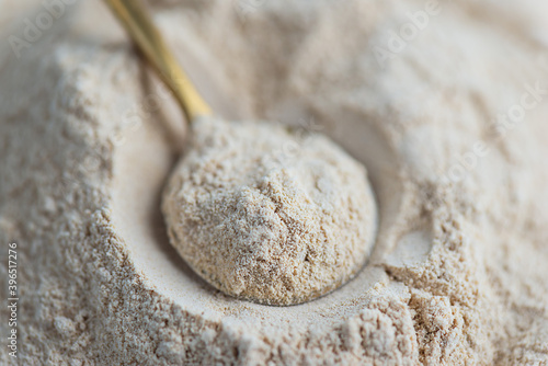 Fotografija Lecithin powder in a spoon. Selective focus.