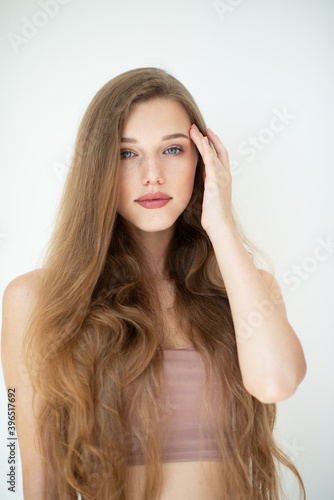 Portrait of a beautiful young woman with clean skin, beauty treatment, cosmetology and anti-aging theme