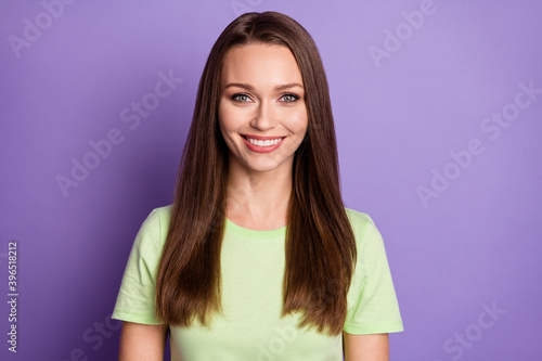 Photo portrait of smiling girl isolated on vivid purple colored background © deagreez