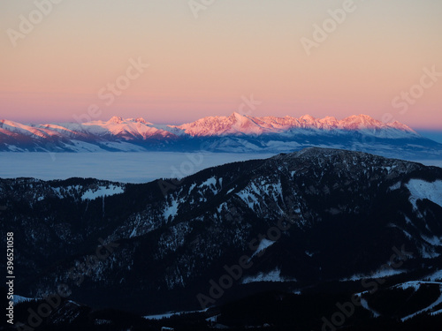 High Tatras from Low Tatras, Snow covered mountains during sunset in winter