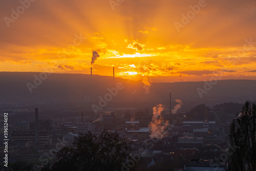 Smoke steam factory in sunset landscape pollution co2 warming  photo