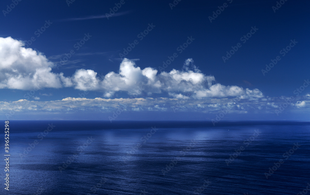 light cumulus clouds over ocean, natural background