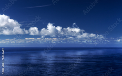 light cumulus clouds over ocean  natural background