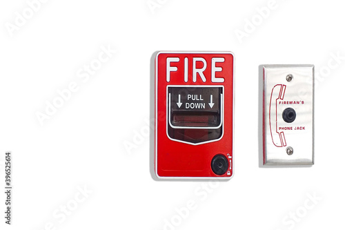 Manual pull fire alarm switch safety system box installed and fire extinguisher on white wall background.