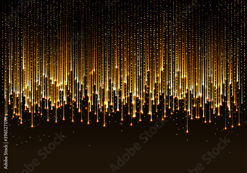 curtain of golden particles on a black background