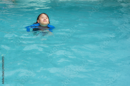 boy child float on water © vachcameraman