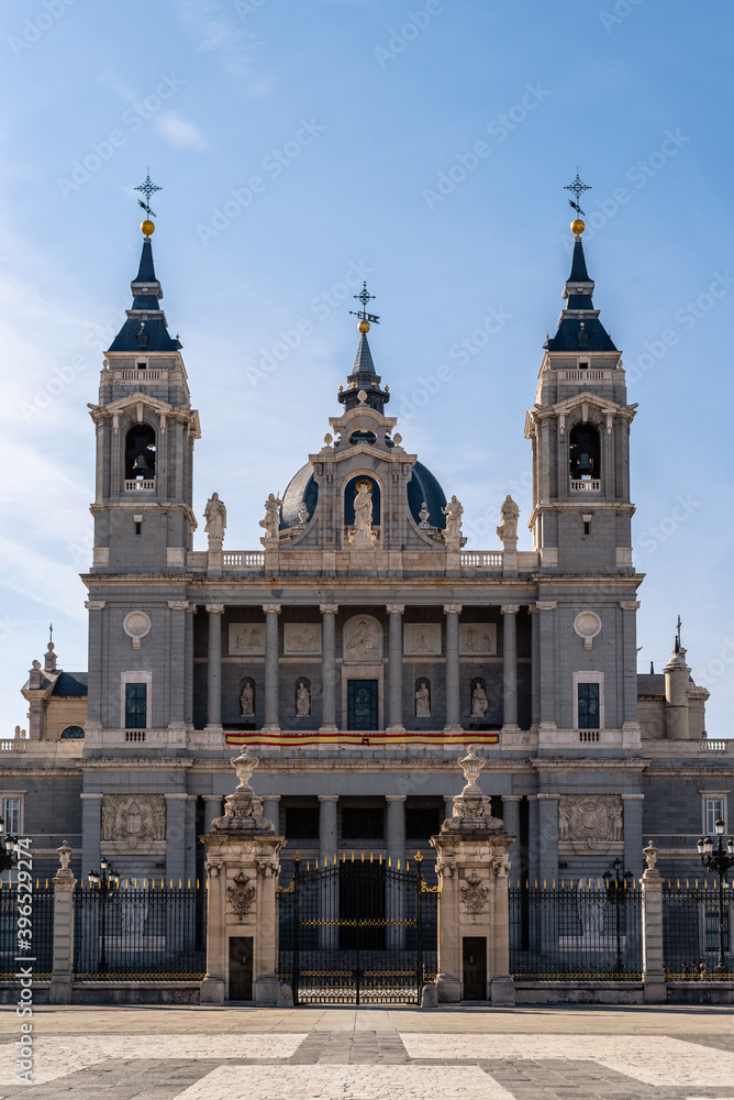 Beautiful view of Cathedral of La Almudena in Madrid on bright blue sky