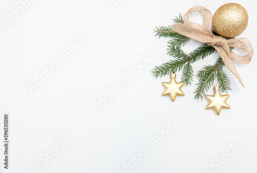christmas gift with gold balls bow isolated on white background
