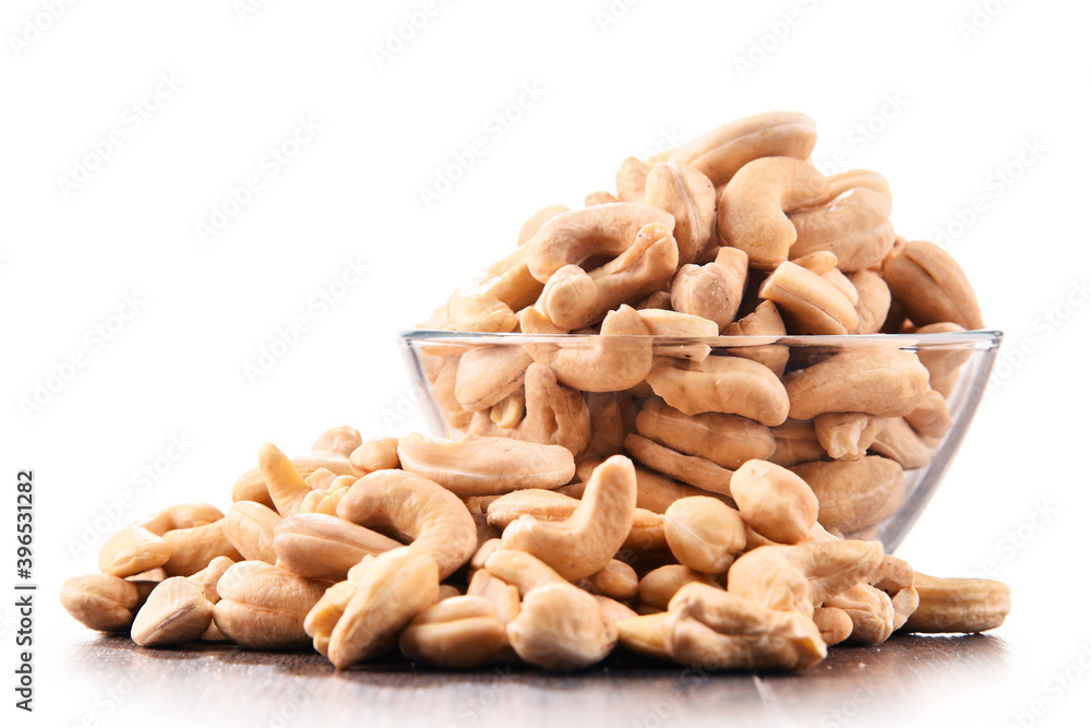 Bowl with cashew nuts isolated on white Bowl with cashew nuts isolated on white