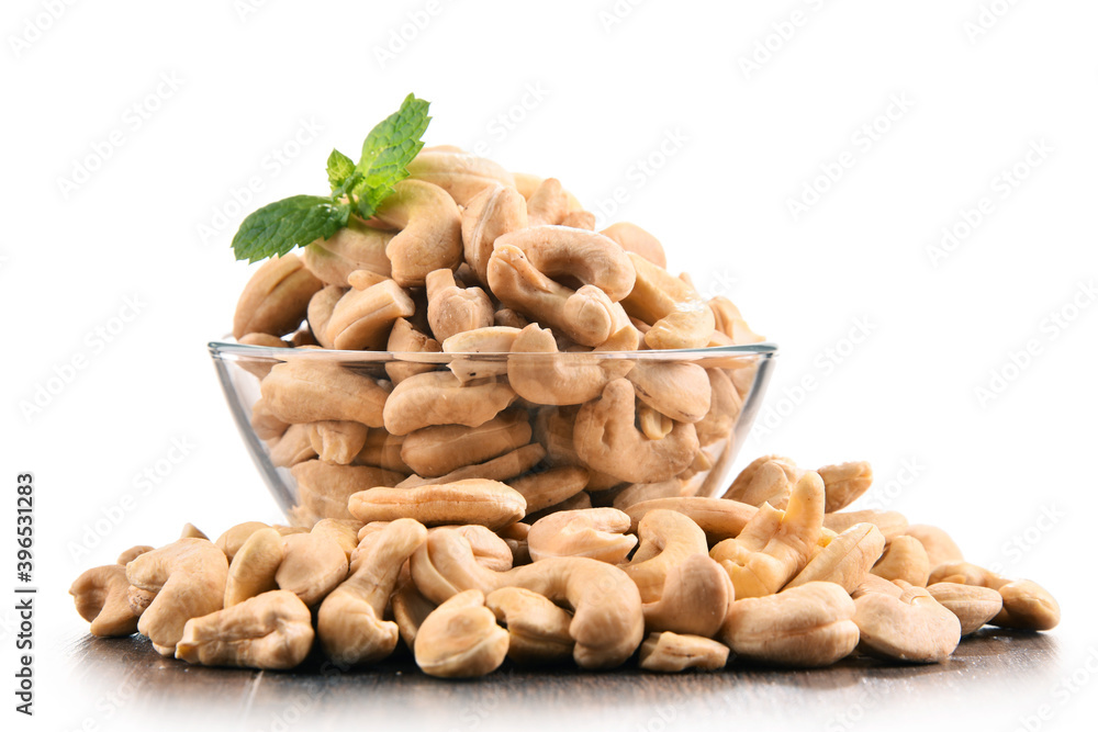 Bowl with cashew nuts isolated on white Bowl with cashew nuts isolated on white
