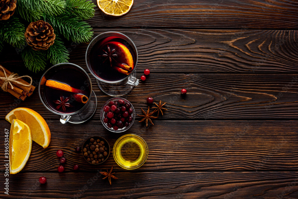 Mulled wine recipe - ingredients for Christmas hot drink in glasses