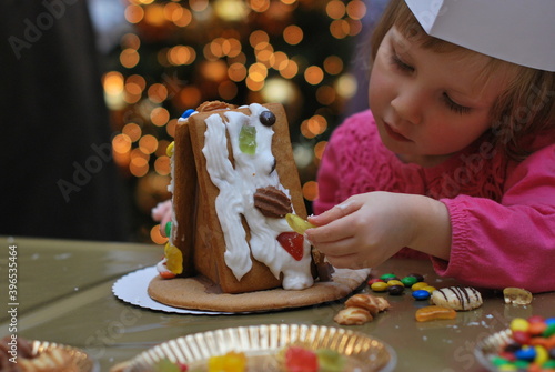 child making Gingerbread house