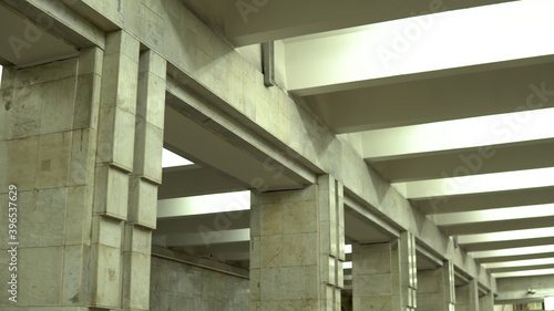 Old marble subway corridor with large columns