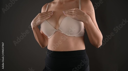 The girl wants to enlarge her breasts. High quality video.