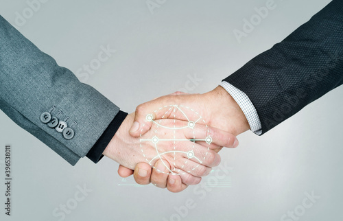 Business people shaking hands for a deal photo