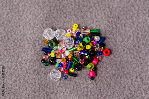 a small collection of assorted beads in a small bag from a giveaway promotion