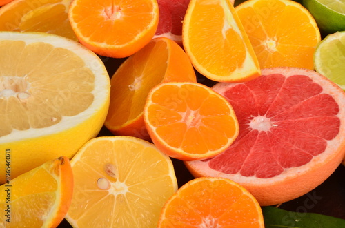 Close-up of sliced citrus fruits  Various citrus fruits  Citrus background