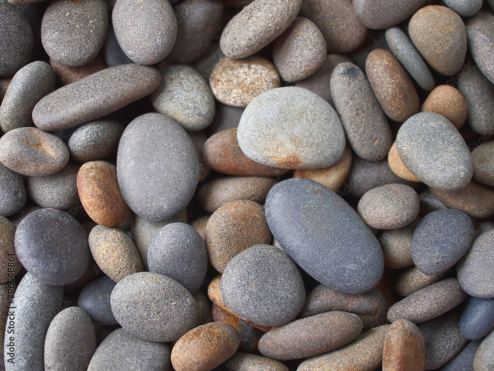 Top view of river pebbles background (Macro shot), Used as wallpaper or backdrop. Top view of river pebbles background (Macro shot), Used as wallpaper or backdrop.