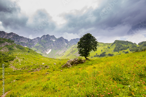 Beautiful mountain landscape at Caucasus mountains with clouds