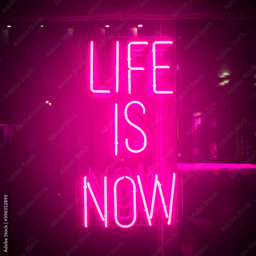 Pink Neon Sign About Life. Urban City Light Window With Bright Signboard Isolated. Life Is Now Quote.