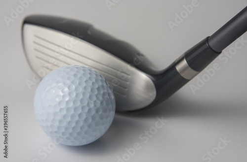golf club and ball on white background