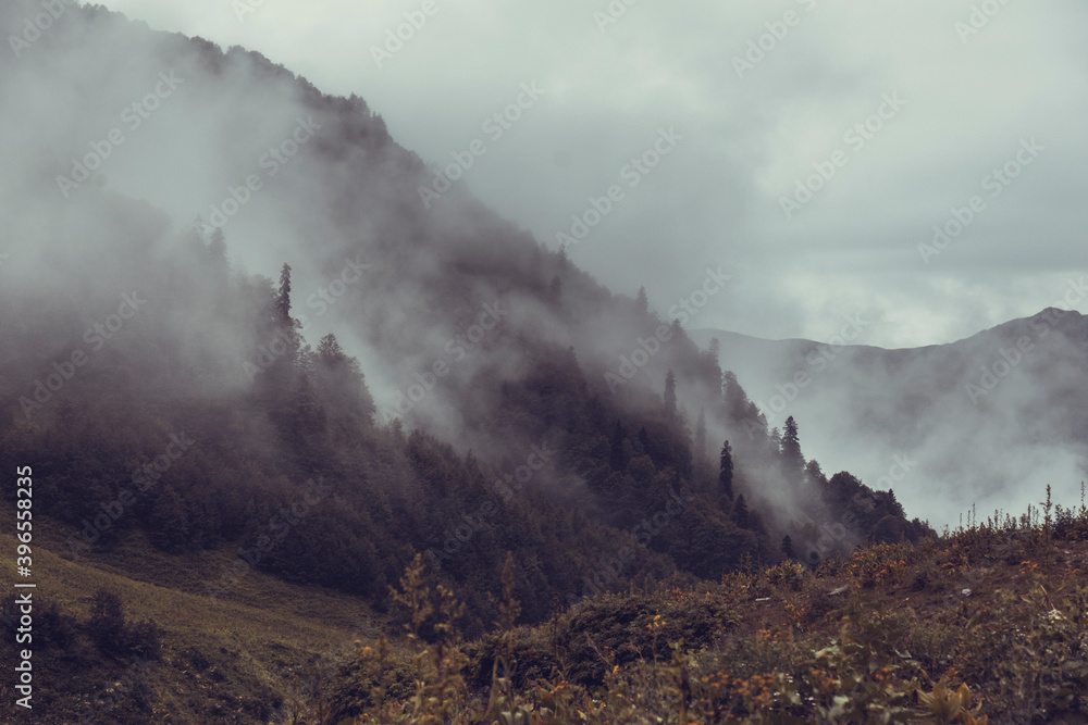 Scenery mountain landscape at Caucasus mountains with clouds