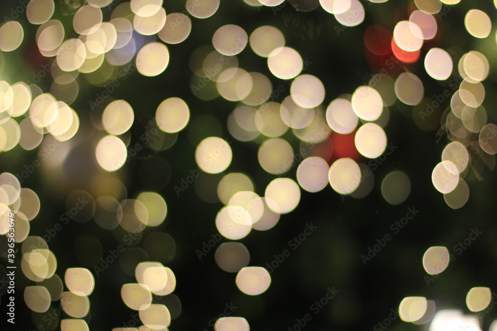 Light night blur bokeh on christmas tree, light bokeh background.