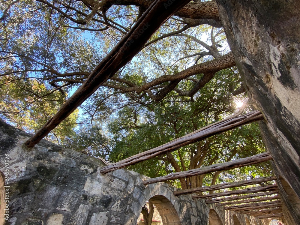 Stone Arched Walkway With Wood Beams