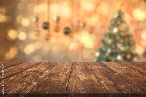 Wooden desk on christmas interior background  new year concept