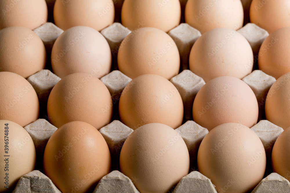 High angle view eggs in cardboard packaging