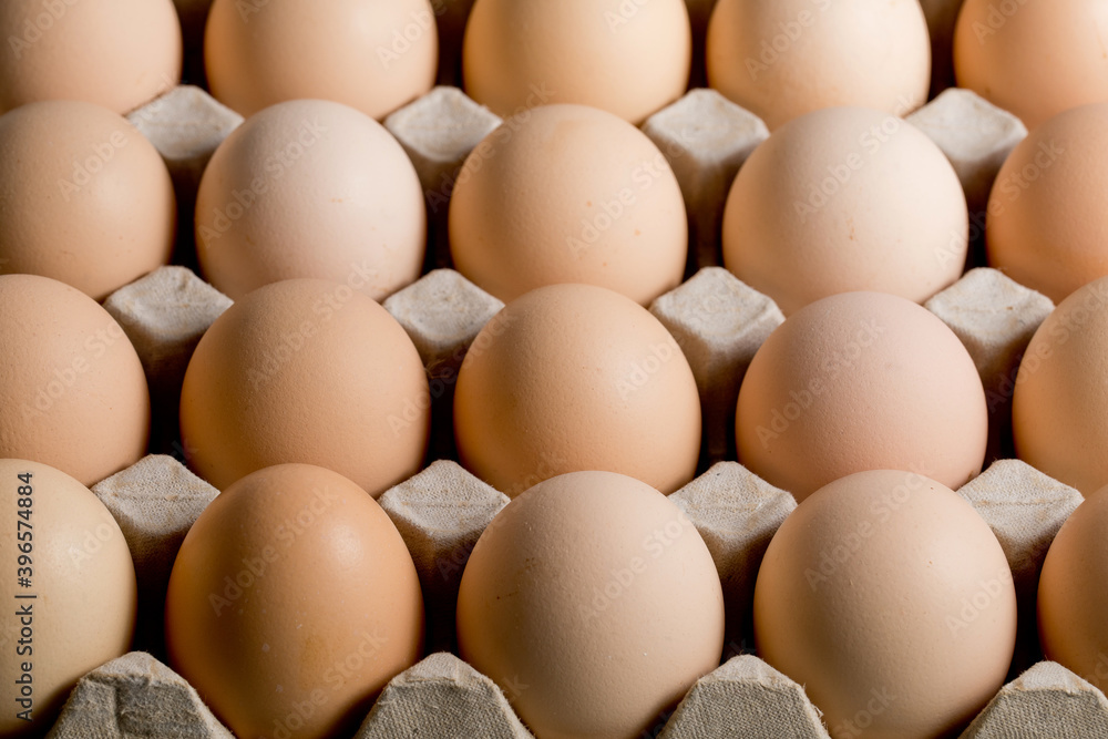 High angle view eggs in cardboard packaging High angle view eggs in cardboard packaging