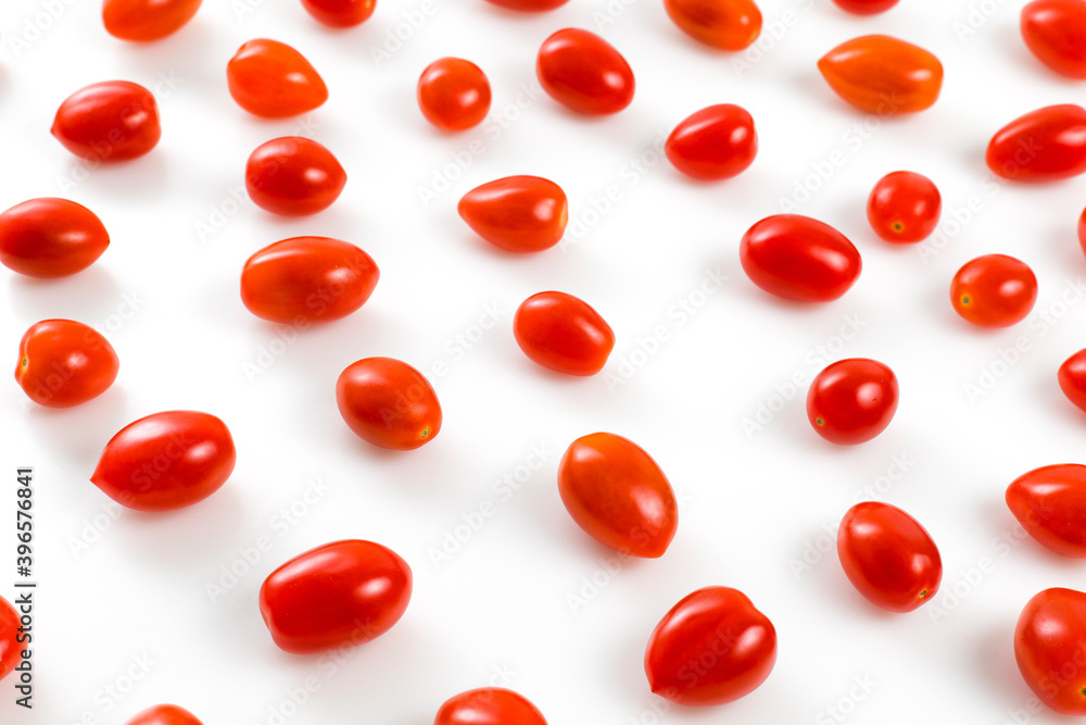 High Angle Shot Of Cherry Tomatoes Against White Background High Angle Shot Of Cherry Tomatoes Against White Background