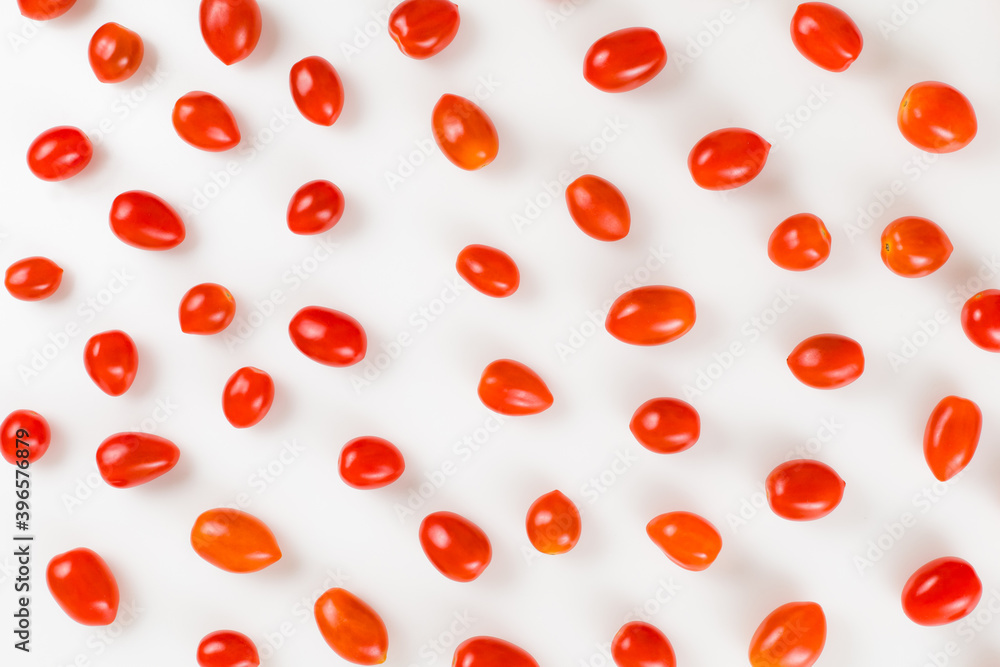 Directly Above View Cherry Tomatoes Against White Background Directly Above View Cherry Tomatoes Against White Background