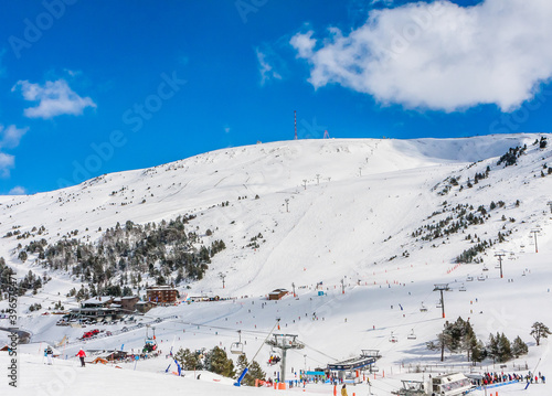 Ski resort GrandVallira. Views of the Pyrenees mountains. Ski cabins with skiers. Rest with the whole family and friends. Andorra