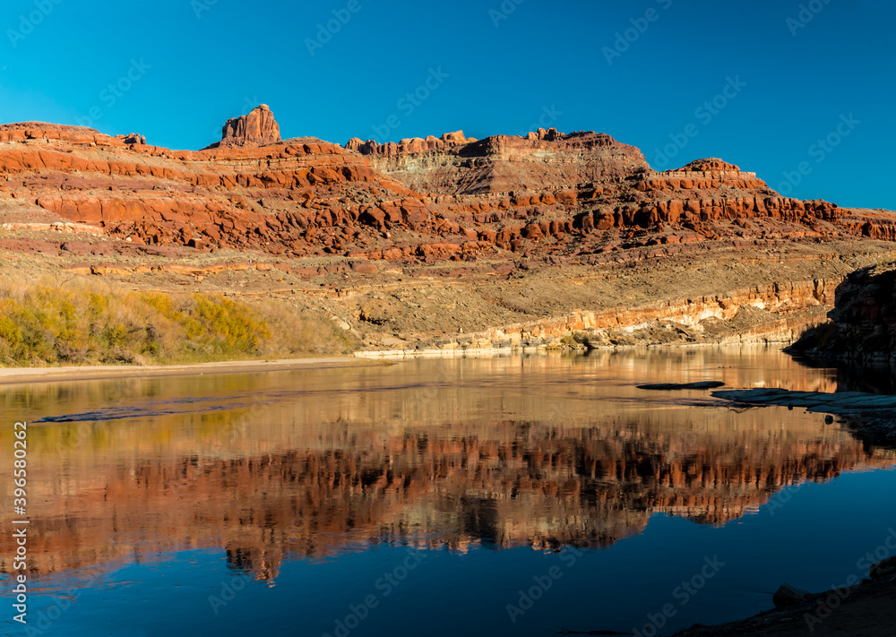 Red Rock Cliffs Reflecting On The Lower Colorado River, Potash Road, Moab, Utah, USA