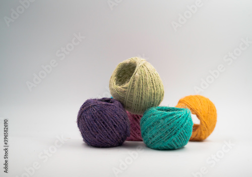 Colorful Yarn balls put on background