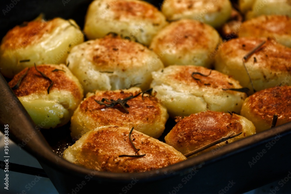 Baked potato with rosemary, pepper and garlic Baked potato with rosemary, pepper and garlic