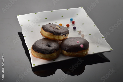 tripple delicious chocolate donuts with candy topping