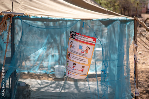 Covid-19 and Disease Control Centre in Kanyemba, Zimbabwe, Africa - 6th July 2020. They try to stop tsetse fly and other insects spreading between areas by using chemicals and temperature checks.  photo