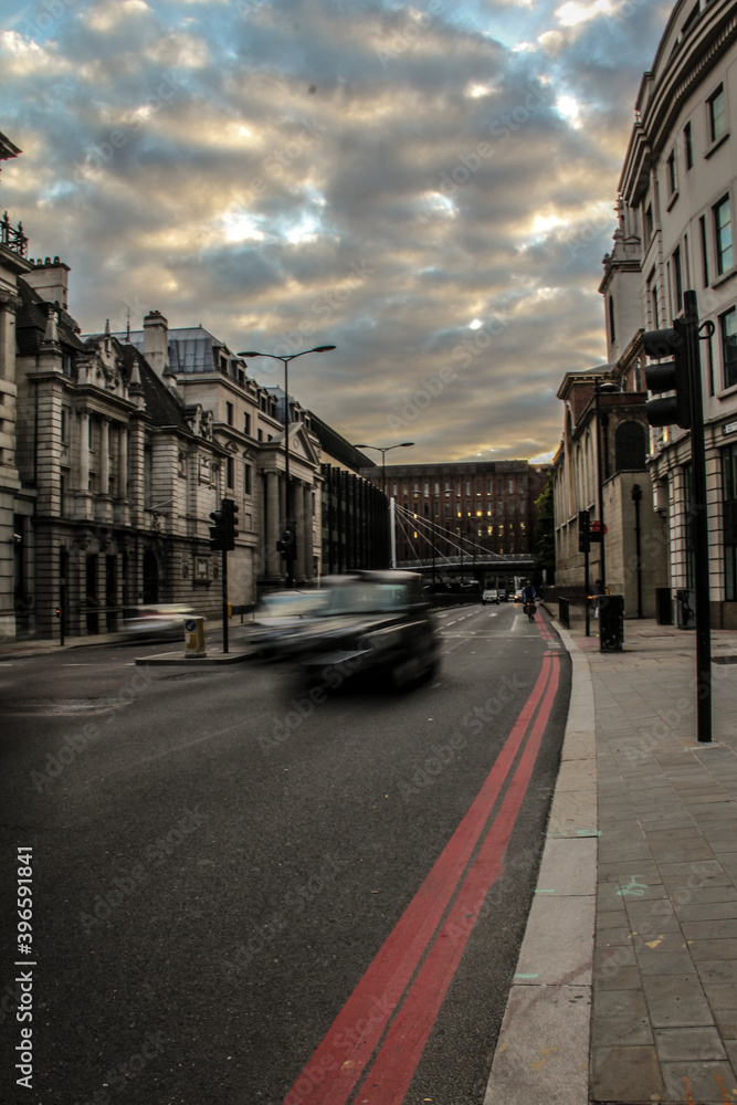 ENGLAND, LONDON - OCTOBER 8 2013: London street with cars at sunset