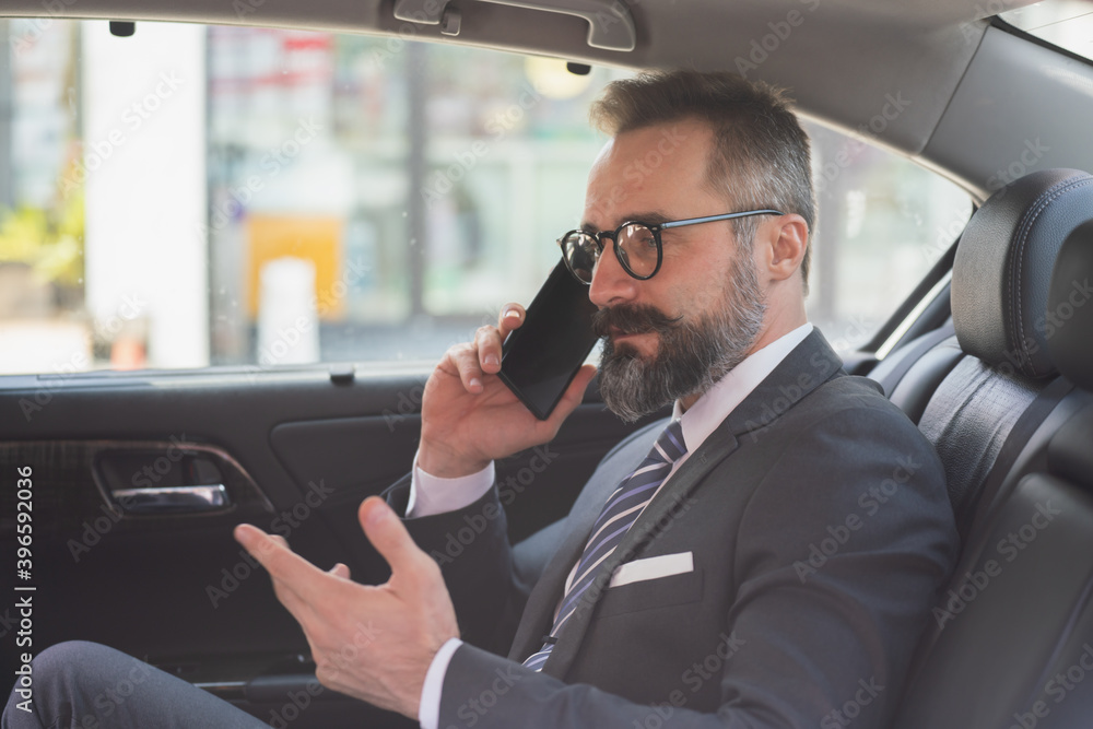 businessman in car. business man happy talking businessman in car. business man happy talking
