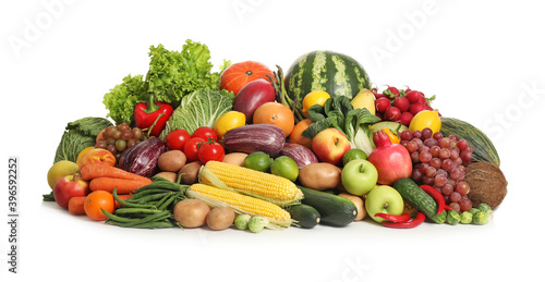 Assortment of fresh organic fruits and vegetables on white background