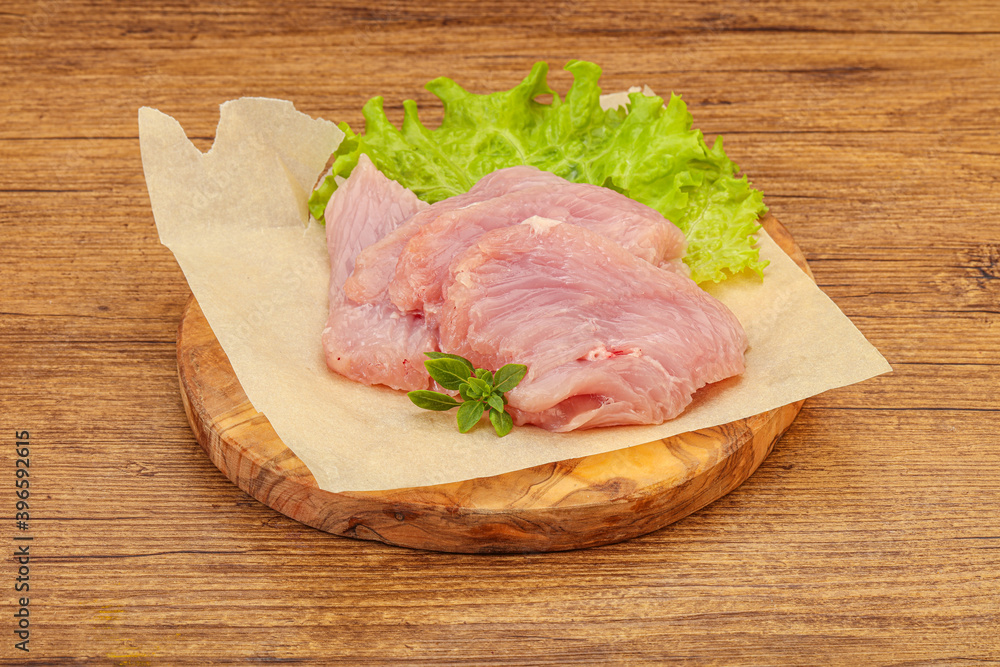 Raw turkey breast steak for cooking