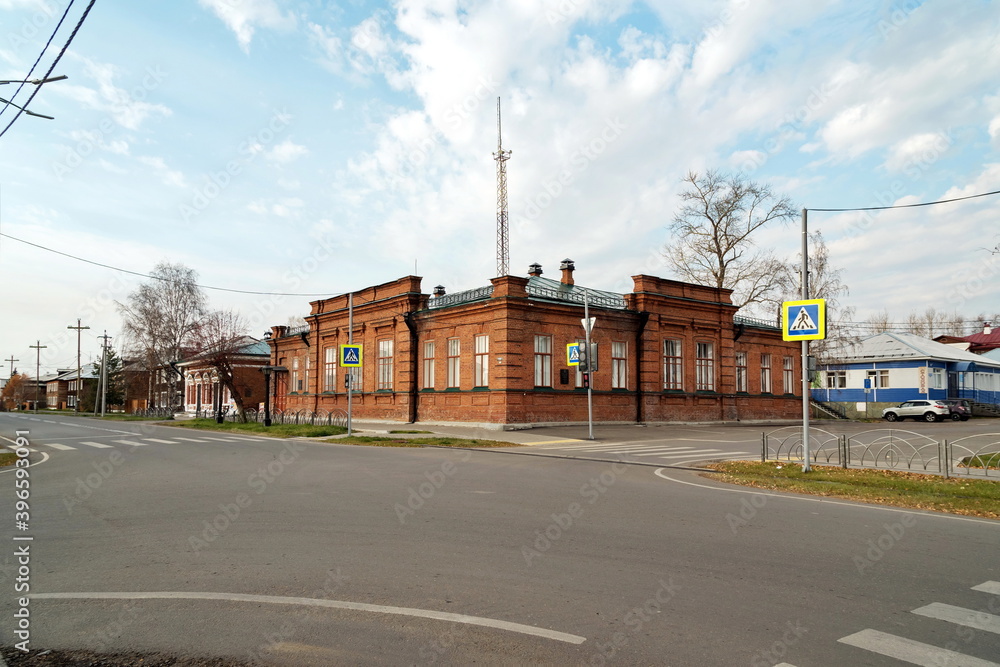 The historical brick building of Balandin's reading room, now the registry office in the city of Yeniseysk, Krasnoyarsk region of Russia. View from Lenin Street. The historical brick building of Balandin's reading room, now the registry office in the city of Yeniseysk, Krasnoyarsk region of Russia. View from Lenin Street.