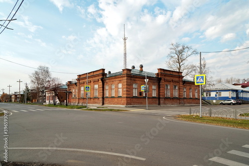 The historical brick building of Balandin's reading room, now the registry office in the city of Yeniseysk, Krasnoyarsk region of Russia. View from Lenin Street.