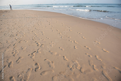 Goa  India 09 November 2020 Footprints of Indian crowd of people on the sand at Baga Beach Goa