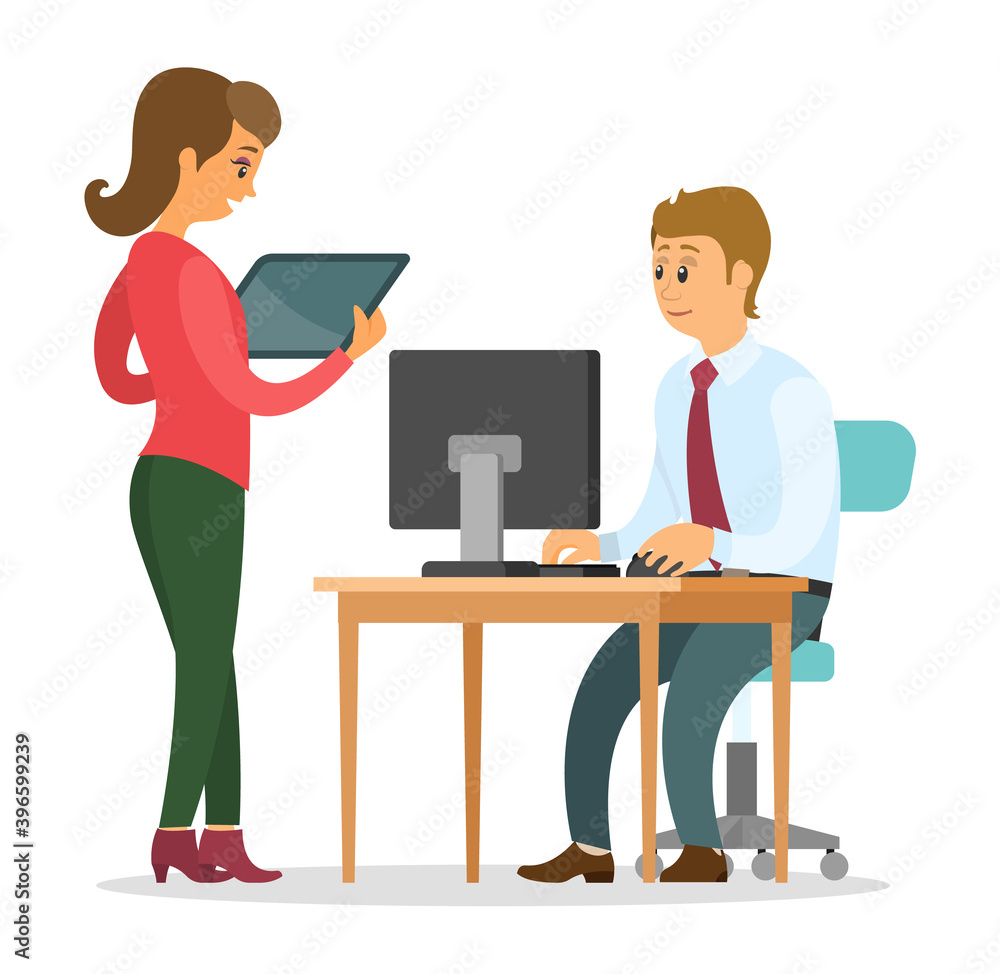 Two communicating colleagues in office sitting at table with computer and standing. Business people discuss new project or startup working together. Teamwork in office. Woman holding digital tablet Two communicating colleagues in office sitting at table with computer and standing. Business people discuss new project or startup working together. Teamwork in office. Woman holding digital tablet