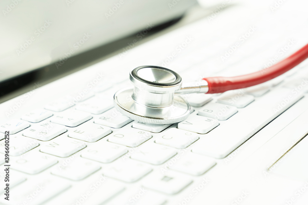 stethoscope on the keyboard, an Internet search concept stethoscope on the keyboard, an Internet search concept